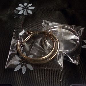 Gold and silver colored hoop earrings Medium